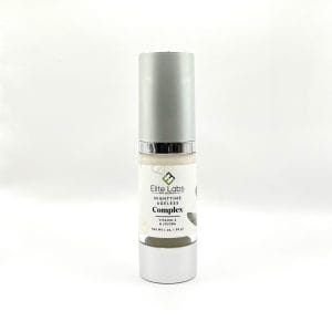Elite Labs' Nighttime Ageless Complex in a silver bottle placed against a white background.