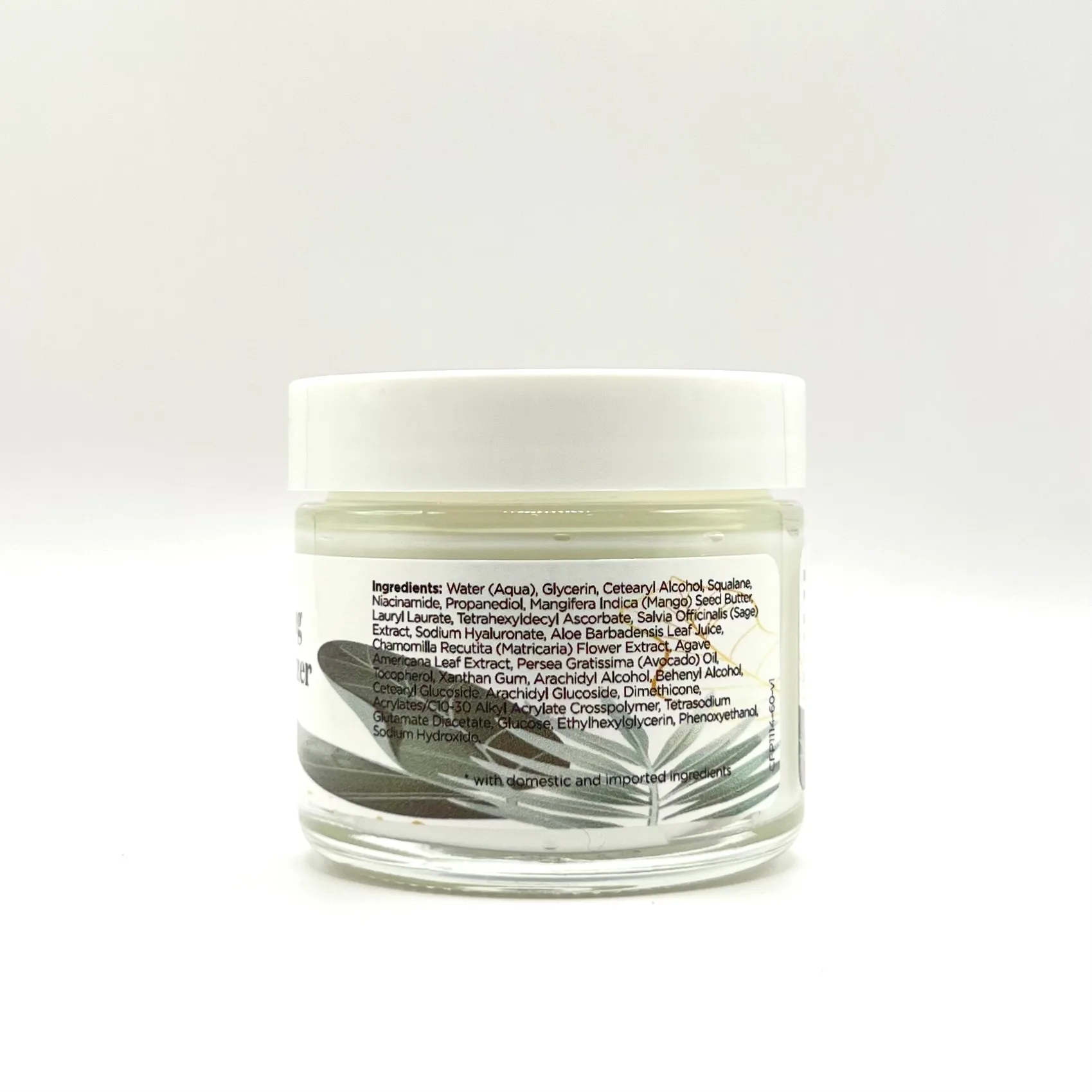 A clear jar of Men’s Vitamin C Hydrating Moisturizer with the ingredient list visible on the back label against a white background.