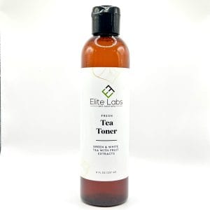 An 8 fl oz bottle of Tea Toner from Elite Labs, featuring green and white tea with fruit extracts.